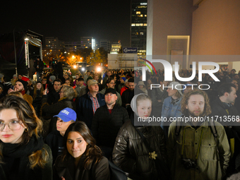 Visitors wait for the official opening at the opening of the new Museum of Modern Art (Muzeum Sztuki Nowoczesnej) in Warsaw, Poland on 25 Oc...