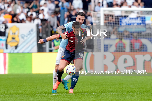 Andrea Pinamonti of Genoa CFC and Mario Gila of SS Lazio compete for the ball during the Serie A Enilive match between SS Lazio and Genoa CF...