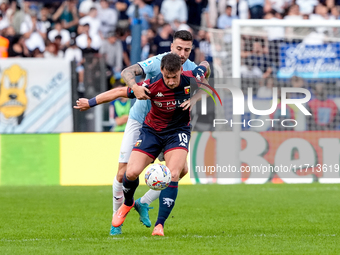 Andrea Pinamonti of Genoa CFC and Mario Gila of SS Lazio compete for the ball during the Serie A Enilive match between SS Lazio and Genoa CF...