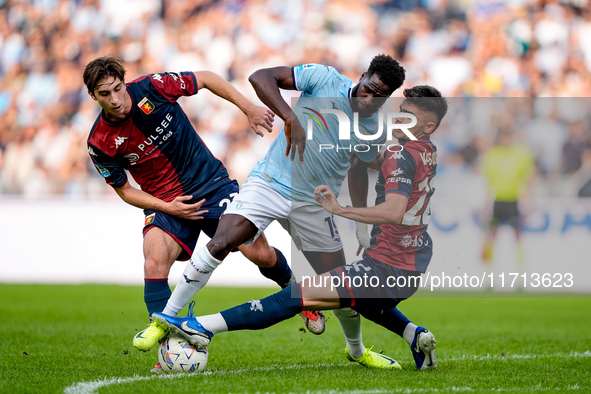 Boulaye Dia of SS Lazio is challenged by Fabio Miretti of Genoa CFC and Johan Vasquez during the Serie A Enilive match between SS Lazio and...