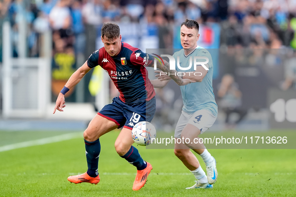 Andrea Pinamonti of Genoa CFC and Gil Patric of SS Lazio compete for the ball during the Serie A Enilive match between SS Lazio and Genoa CF...