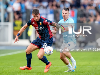 Andrea Pinamonti of Genoa CFC and Gil Patric of SS Lazio compete for the ball during the Serie A Enilive match between SS Lazio and Genoa CF...