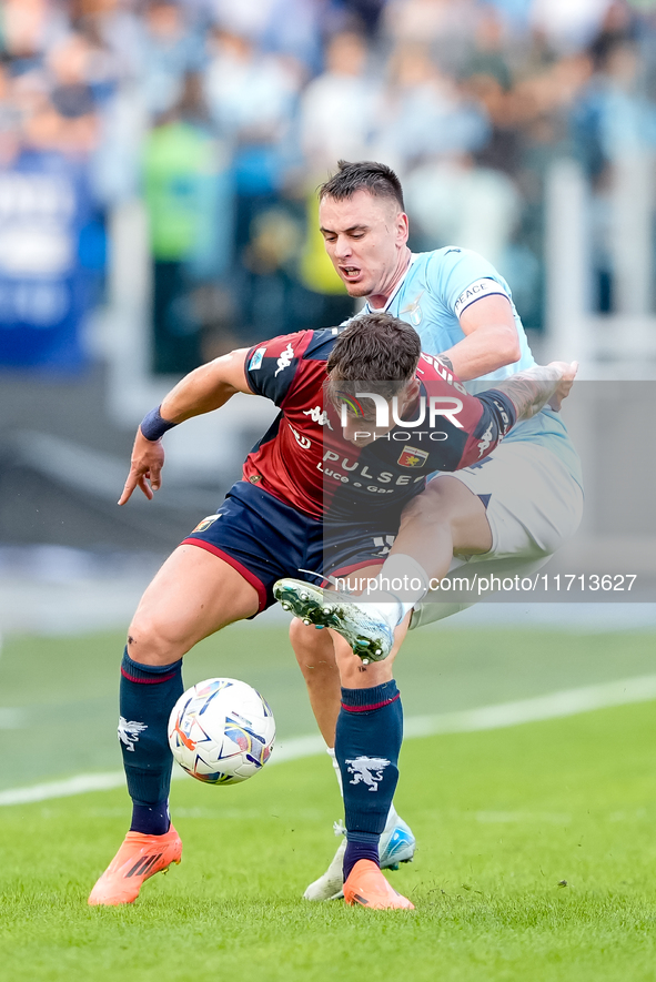 Andrea Pinamonti of Genoa CFC and Gil Patric of SS Lazio compete for the ball during the Serie A Enilive match between SS Lazio and Genoa CF...