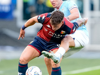 Andrea Pinamonti of Genoa CFC and Gil Patric of SS Lazio compete for the ball during the Serie A Enilive match between SS Lazio and Genoa CF...