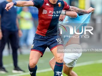 Andrea Pinamonti of Genoa CFC and Gil Patric of SS Lazio compete for the ball during the Serie A Enilive match between SS Lazio and Genoa CF...