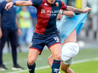 Andrea Pinamonti of Genoa CFC and Gil Patric of SS Lazio compete for the ball during the Serie A Enilive match between SS Lazio and Genoa CF...