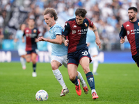 Alessandro Zanoli of Genoa CFC and Nicolo' Rovella of SS Lazio during the Serie A Enilive match between SS Lazio and Genoa CF at Stadio Olim...