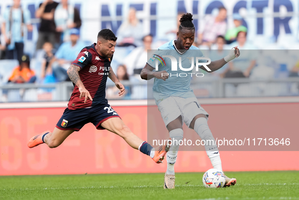 Stefano Sabelli of Genoa CFC and Tijjani Noslin of SS Lazio compete for the ball during the Serie A Enilive match between SS Lazio and Genoa...