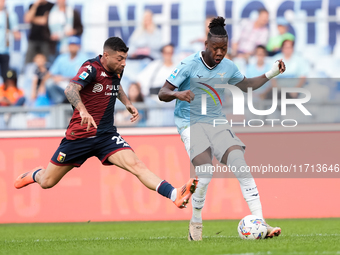 Stefano Sabelli of Genoa CFC and Tijjani Noslin of SS Lazio compete for the ball during the Serie A Enilive match between SS Lazio and Genoa...