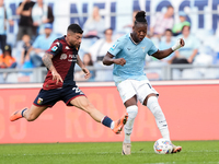 Stefano Sabelli of Genoa CFC and Tijjani Noslin of SS Lazio compete for the ball during the Serie A Enilive match between SS Lazio and Genoa...