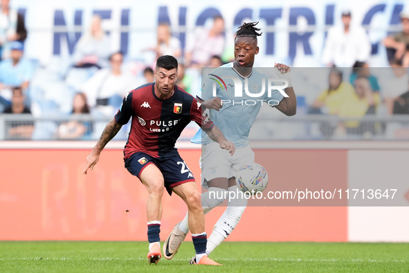 Stefano Sabelli of Genoa CFC and Tijjani Noslin of SS Lazio compete for the ball during the Serie A Enilive match between SS Lazio and Genoa...