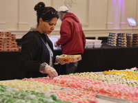 People purchase traditional Indian sweets at a sweet shop for the upcoming festival of Diwali in Mississauga, Ontario, Canada, on October 26...