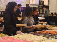 People purchase traditional Indian sweets at a sweet shop for the upcoming festival of Diwali in Mississauga, Ontario, Canada, on October 26...