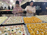 People purchase traditional Indian sweets at a sweet shop for the upcoming festival of Diwali in Mississauga, Ontario, Canada, on October 26...