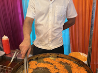 A man fries jalebis (a traditional Indian sweet) at a sweet shop for the upcoming festival of Diwali in Mississauga, Ontario, Canada, on Oct...