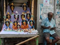 A man sells idols of Goddess Kali ahead of the Kali Puja festival in Kolkata, India, on October 27, 2024. (