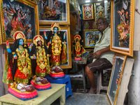 A man sells idols of Goddess Kali ahead of the Kali Puja festival in Kolkata, India, on October 27, 2024. (