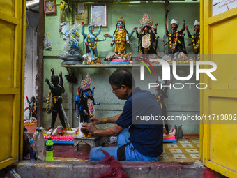 Artisans and workers make idols of Goddess Kali ahead of the Kali Puja festival in Kolkata, India, on October 27, 2024. (