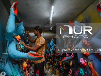 Artisans and workers make idols of Goddess Kali ahead of the Kali Puja festival in Kolkata, India, on October 27, 2024. (