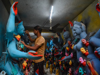 Artisans and workers make idols of Goddess Kali ahead of the Kali Puja festival in Kolkata, India, on October 27, 2024. (