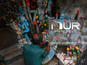 Artisans and workers make idols of Goddess Kali ahead of the Kali Puja festival in Kolkata, India, on October 27, 2024. (