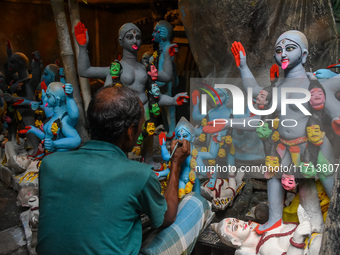 Artisans and workers make idols of Goddess Kali ahead of the Kali Puja festival in Kolkata, India, on October 27, 2024. (