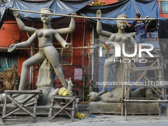 Artisans and workers make idols of Goddess Kali ahead of the Kali Puja festival in Kolkata, India, on October 27, 2024. (