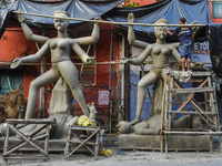 Artisans and workers make idols of Goddess Kali ahead of the Kali Puja festival in Kolkata, India, on October 27, 2024. (