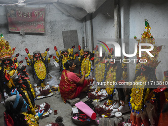 Artisans and workers make idols of Goddess Kali ahead of the Kali Puja festival in Kolkata, India, on October 27, 2024. (