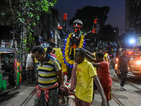 Artisans and workers make idols of Goddess Kali ahead of the Kali Puja festival in Kolkata, India, on October 27, 2024. (