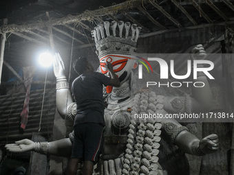 Artisans and workers make idols of Goddess Kali ahead of the Kali Puja festival in Kolkata, India, on October 27, 2024. (