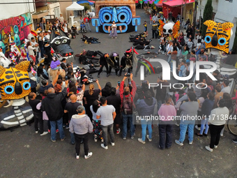 Cardboard skulls are seen during the ''Tecuan Tlaloc'' exhibition, a project of The Jaen Cartoneria collective, in honor of the God Tlaloc a...