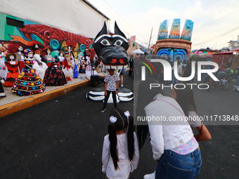 Cardboard skulls are seen during the ''Tecuan Tlaloc'' exhibition, a project of The Jaen Cartoneria collective, in honor of the God Tlaloc a...