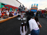 Cardboard skulls are seen during the ''Tecuan Tlaloc'' exhibition, a project of The Jaen Cartoneria collective, in honor of the God Tlaloc a...