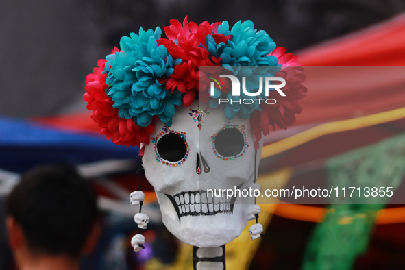 A cardboard skull is seen during the ''Tecuan Tlaloc'' exhibition, a project of The Jaen Cartoneria collective, in honor of the God Tlaloc a...