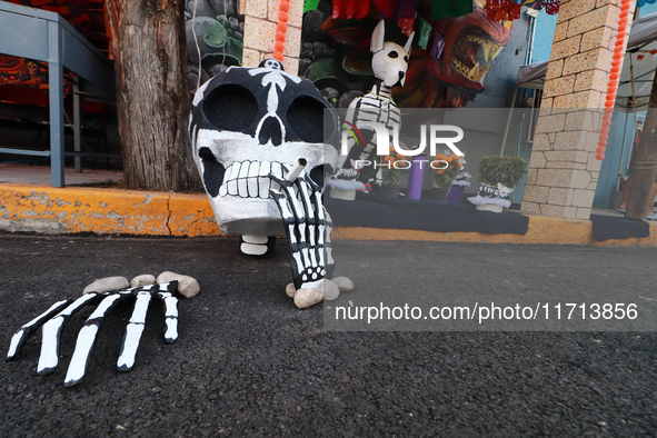 Cardboard skulls are seen during the ''Tecuan Tlaloc'' exhibition, a project of The Jaen Cartoneria collective, in honor of the God Tlaloc a...