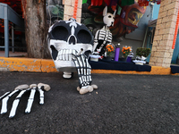 Cardboard skulls are seen during the ''Tecuan Tlaloc'' exhibition, a project of The Jaen Cartoneria collective, in honor of the God Tlaloc a...