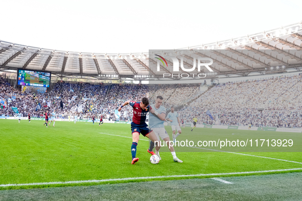 Andrea Pinamonti of Genoa CFC and Gil Patric of SS Lazio compete for the ball during the Serie A Enilive match between SS Lazio and Genoa CF...