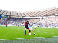 Andrea Pinamonti of Genoa CFC and Gil Patric of SS Lazio compete for the ball during the Serie A Enilive match between SS Lazio and Genoa CF...