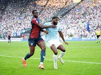 David Ankeye of Genoa CFC and Nuno Tavares of SS Lazio compete for the ball during the Serie A Enilive match between SS Lazio and Genoa CF a...