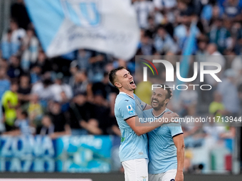 Pedro of SS Lazio celebrates with Gil Patric after scoring second goal during the Serie A Enilive match between SS Lazio and Genoa CF at Sta...