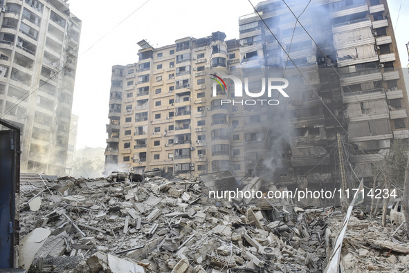 Damage occurs at the site of overnight Israeli airstrikes that target Beirut's southern suburb of Hadath in Beirut, Lebanon, on October 27,...