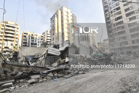 Damage occurs at the site of overnight Israeli airstrikes that target Beirut's southern suburb of Hadath in Beirut, Lebanon, on October 27,...