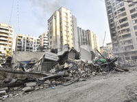 Damage occurs at the site of overnight Israeli airstrikes that target Beirut's southern suburb of Hadath in Beirut, Lebanon, on October 27,...