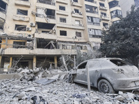 Damage occurs at the site of overnight Israeli airstrikes that target Beirut's southern suburb of Hadath in Beirut, Lebanon, on October 27,...