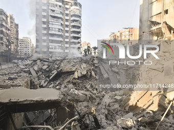 Damage occurs at the site of overnight Israeli airstrikes that target Beirut's southern suburb of Hadath in Beirut, Lebanon, on October 27,...