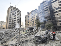 Damage occurs at the site of overnight Israeli airstrikes that target Beirut's southern suburb of Hadath in Beirut, Lebanon, on October 27,...