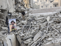 Damage occurs at the site of overnight Israeli airstrikes that target Beirut's southern suburb of Hadath in Beirut, Lebanon, on October 27,...