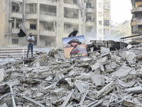 Damage occurs at the site of overnight Israeli airstrikes that target Beirut's southern suburb of Hadath in Beirut, Lebanon, on October 27,...