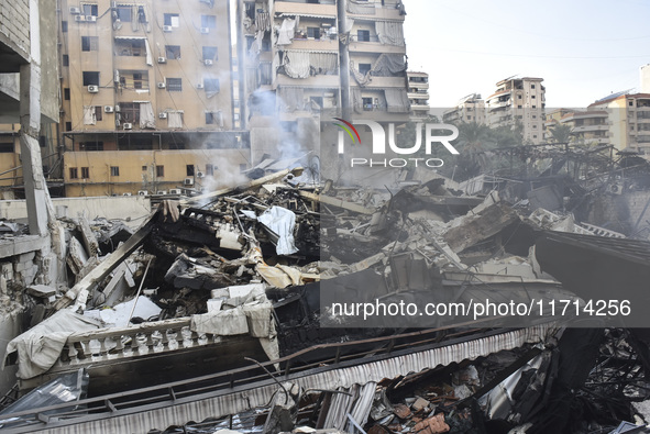 Damage occurs at the site of overnight Israeli airstrikes that target Beirut's southern suburb of Hadath in Beirut, Lebanon, on October 27,...